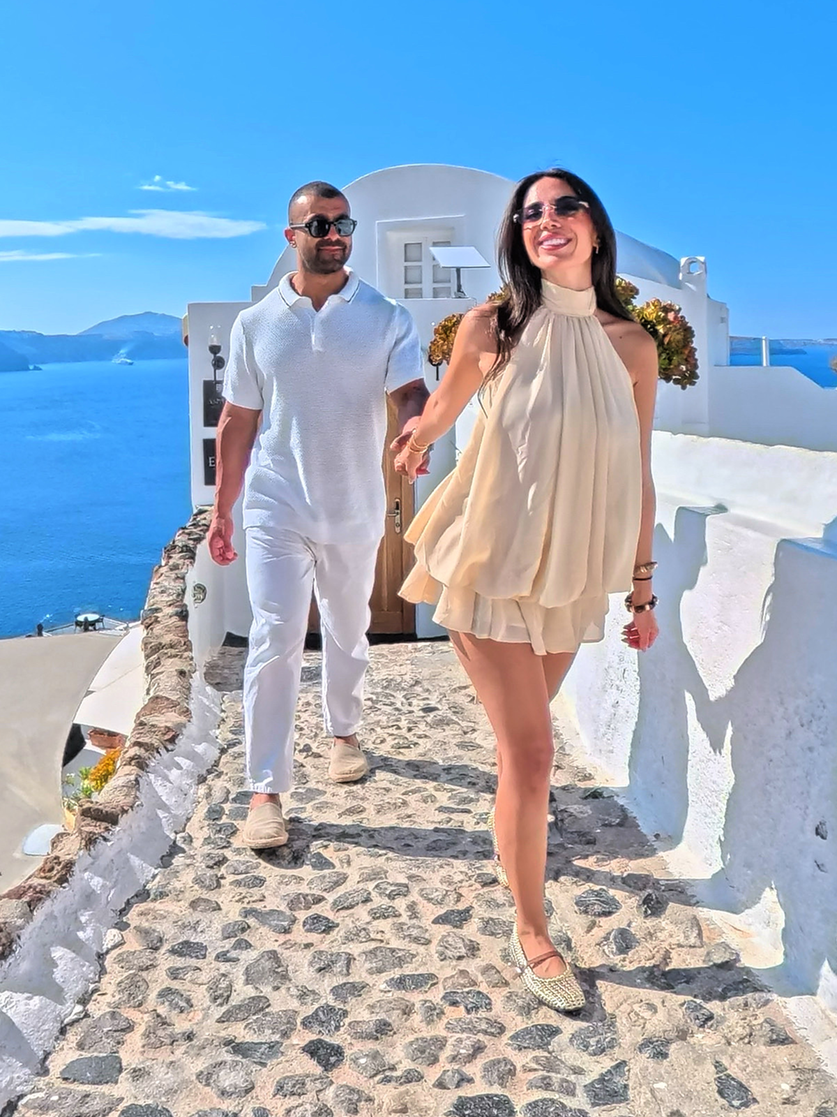 A couple whose digital wedding invitation includes built-in RSVP tracking