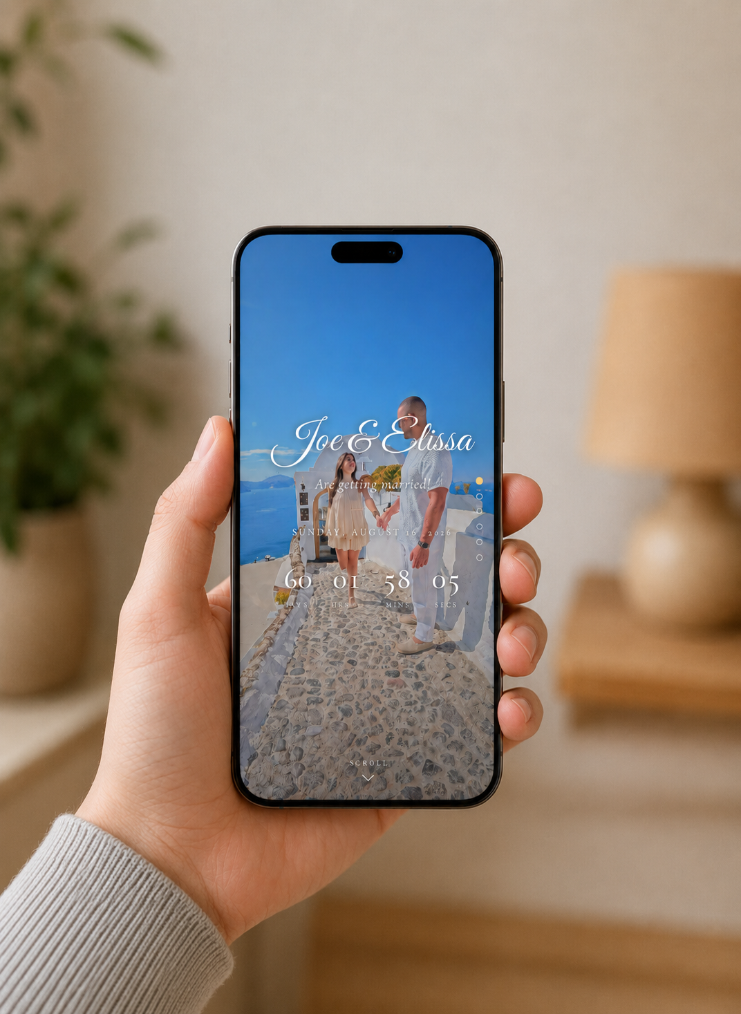 A digital wedding invitation shown on a phone held in hand